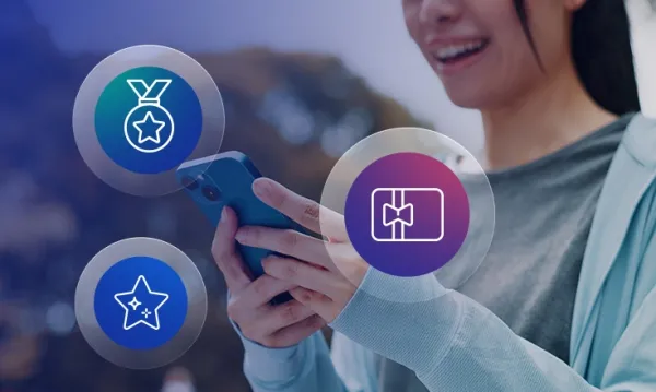 Grafica che rappresenta il concetto di gamification con icone di sfide, premi e progressi.